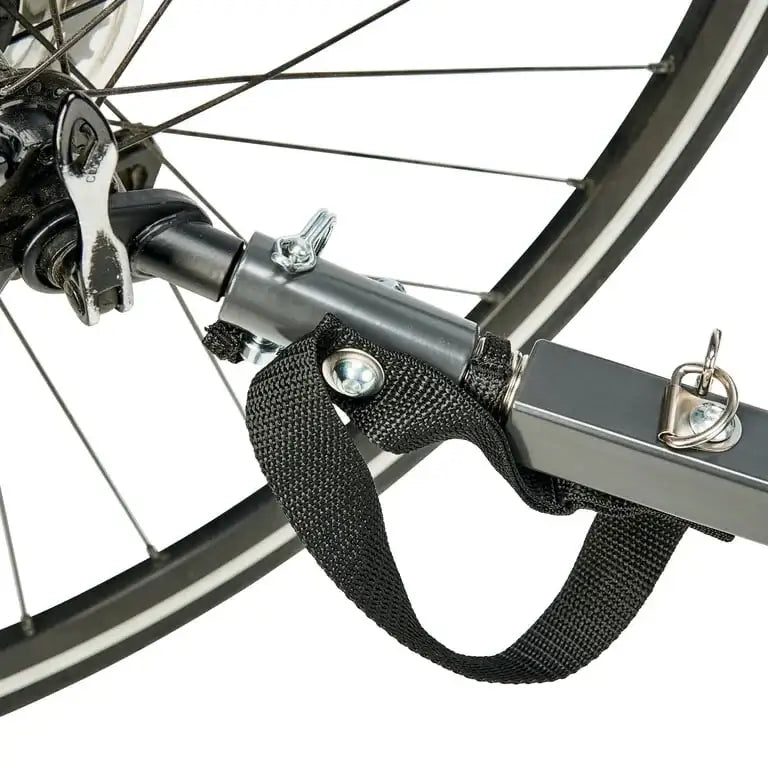 Close-up of Allen Sports 2-in-1 bike trailer hitch showcasing metal axle connector and black safety strap on white background