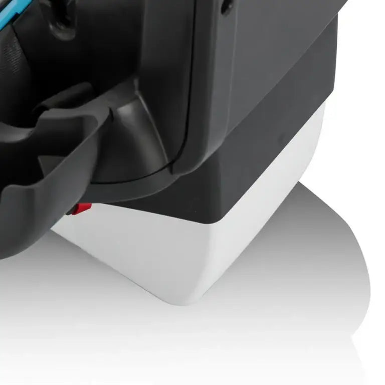 Close-up of the Evenflo Shyft DualRide infant car seat and stroller travel system showing its black car seat base and white support