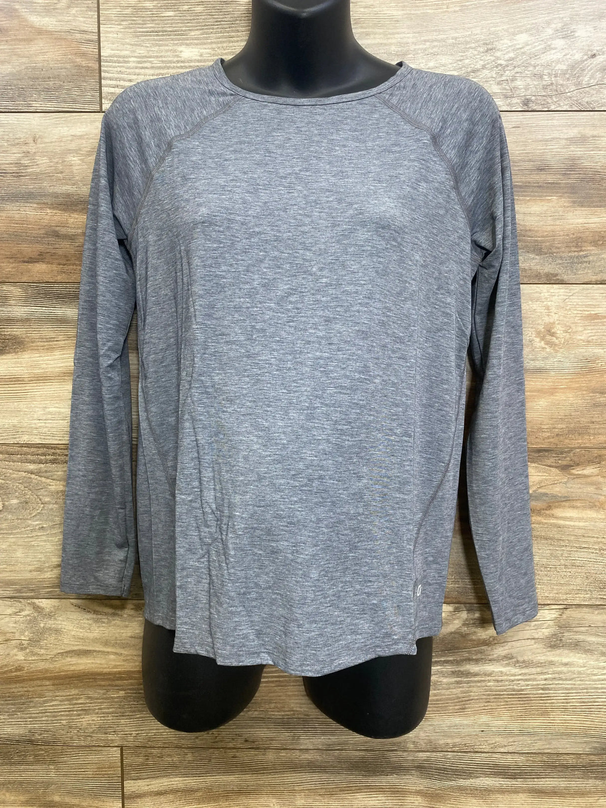 Front view of Gap maternity long-sleeve shirt in grey heather on black mannequin showing raglan sleeves and relaxed fit