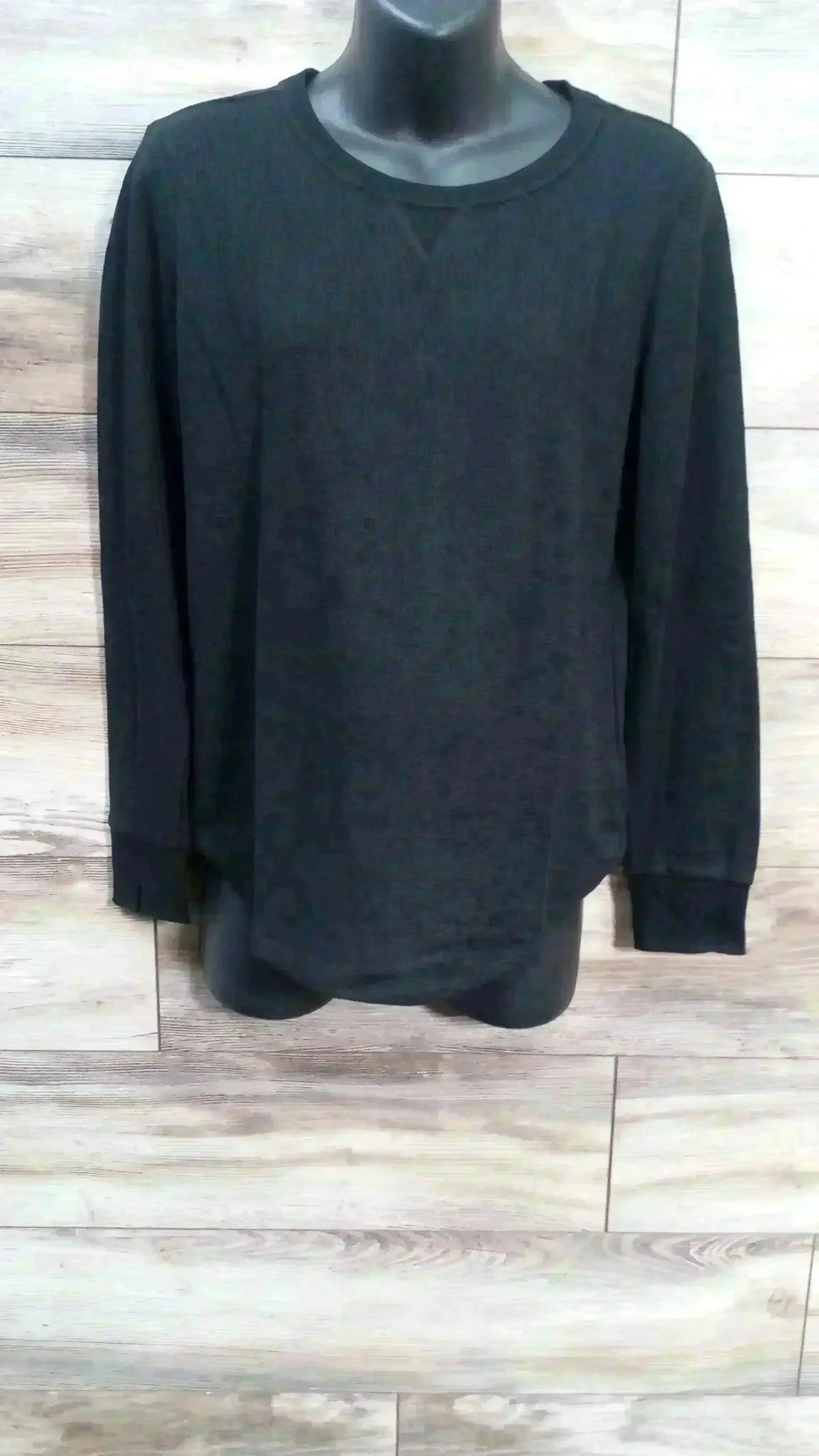 Front view of Gap maternity waffle-knit black T-shirt showcasing textured waffle knit and scoop neckline on white background