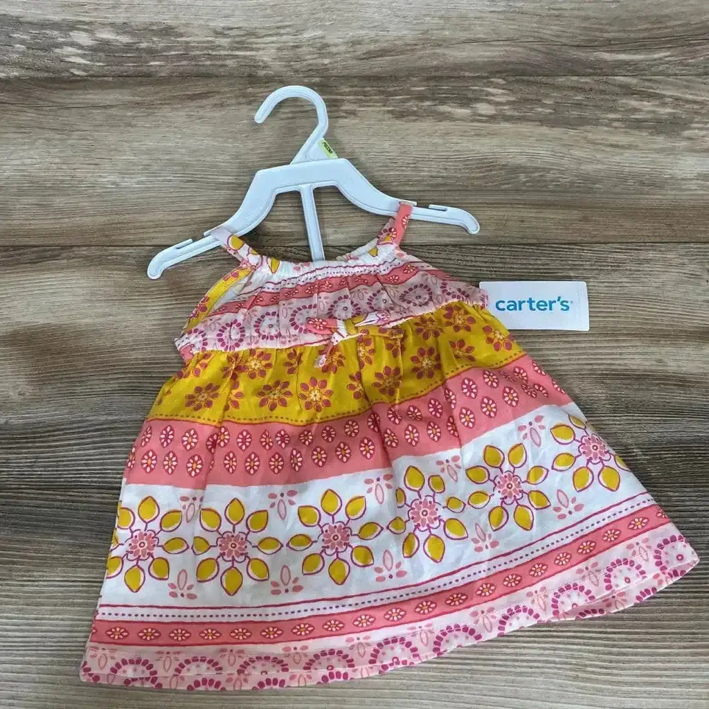 Front view of Carter’s two-piece dress and bloomers set in size 3 months showcasing a multicolor floral pattern