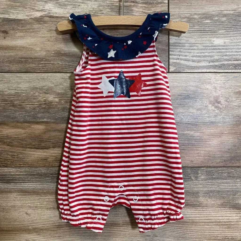 Front view of red-and-white striped 0–3m romper with navy ruffle collar, star motifs, and snap crotch on wooden background