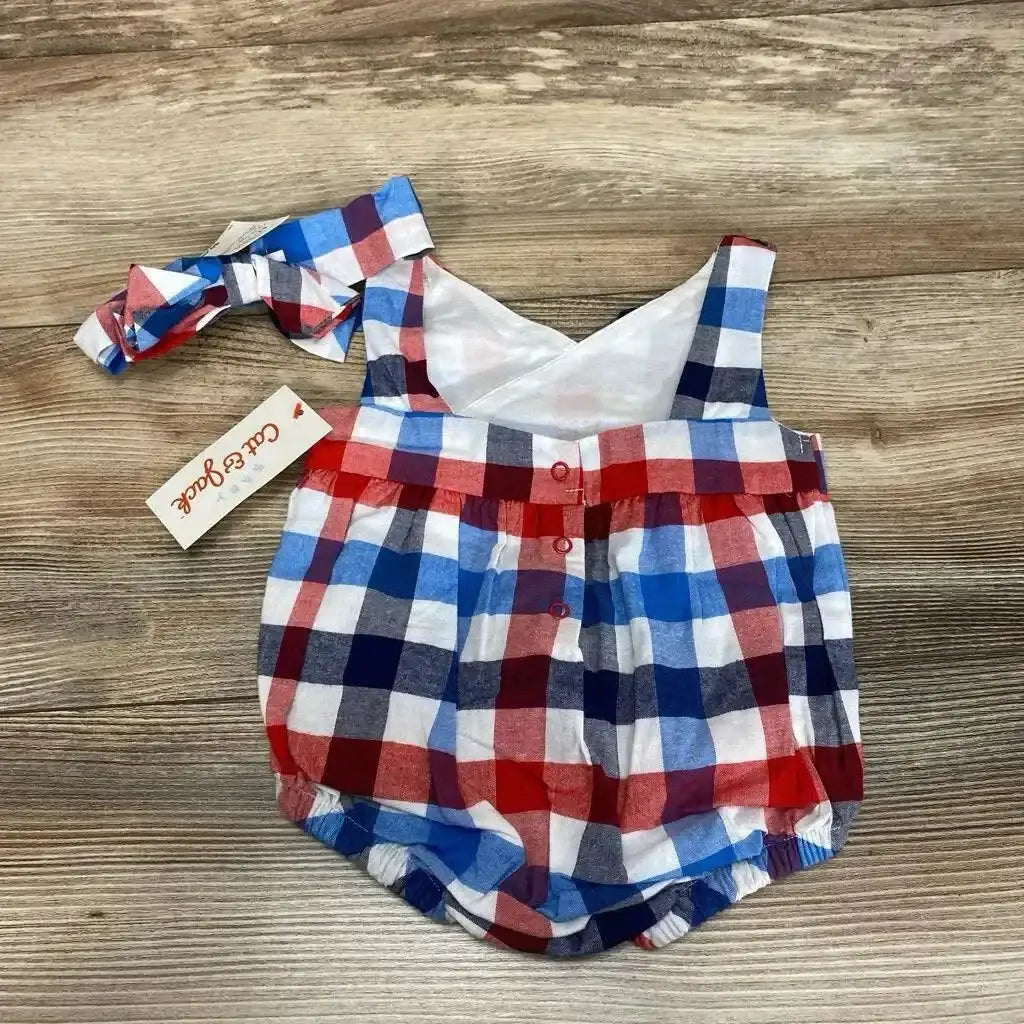 Front view of Cat & Jack blue plaid romper set, size 0-3 months, with snap closures and short sleeves on white background