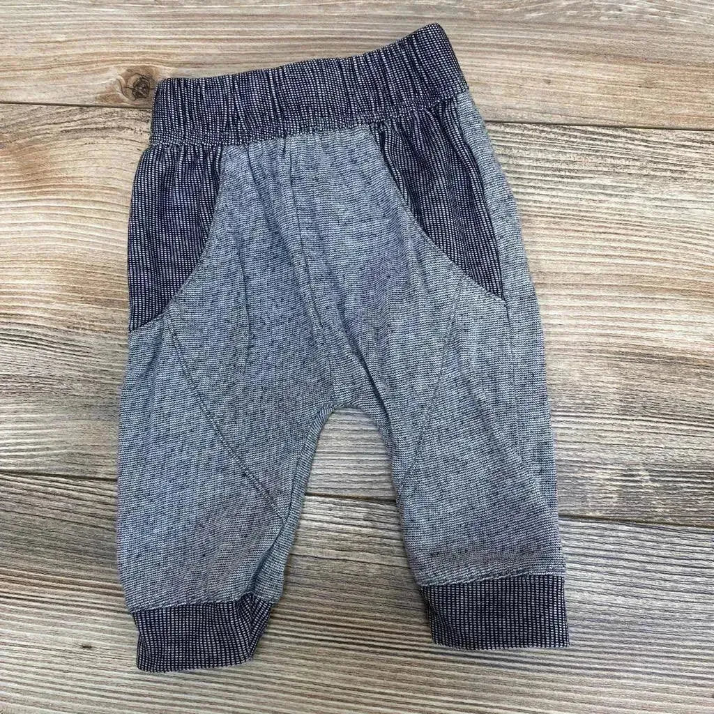 Front view of Cat & Jack grey newborn pants showing elastic waistband and straight legs on white background