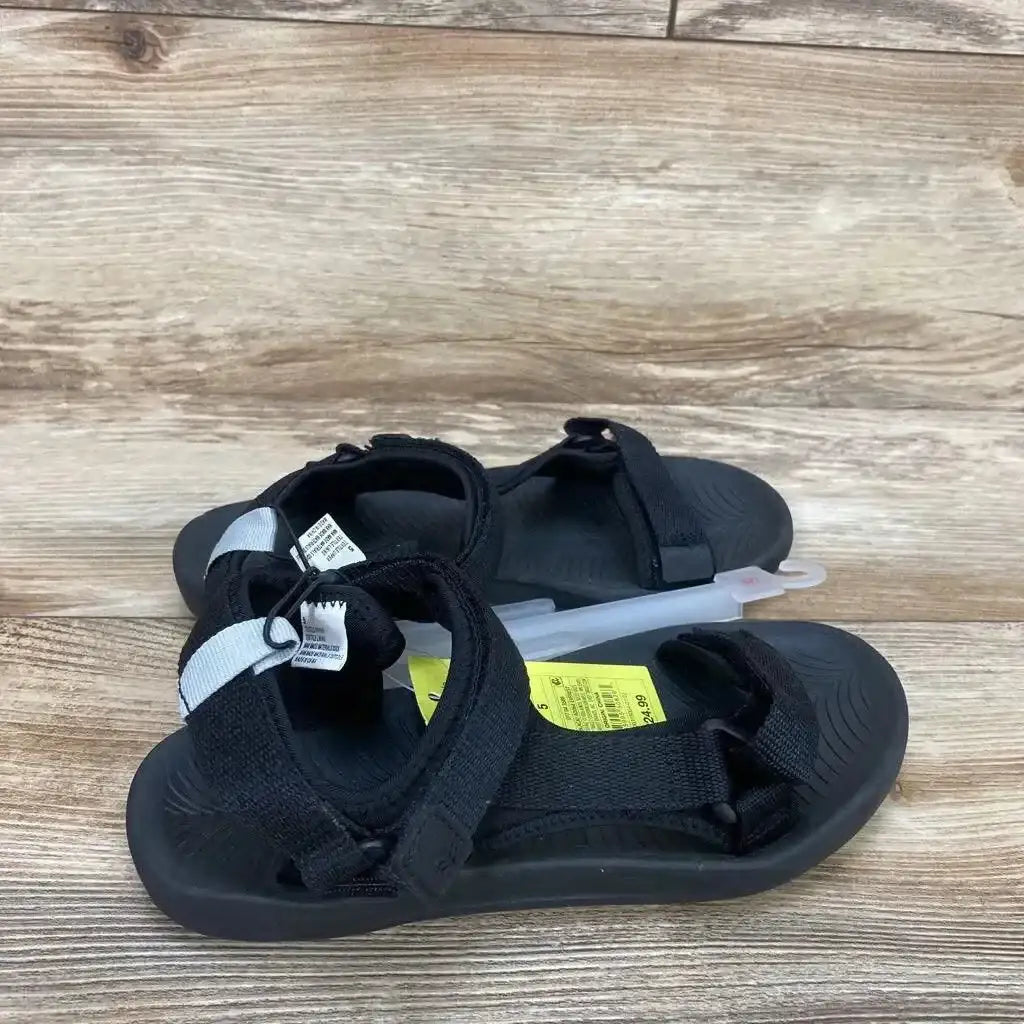 Angled view of black All in Motion Everest sandals, size 5Y, showing hook-and-loop straps and sole on white background