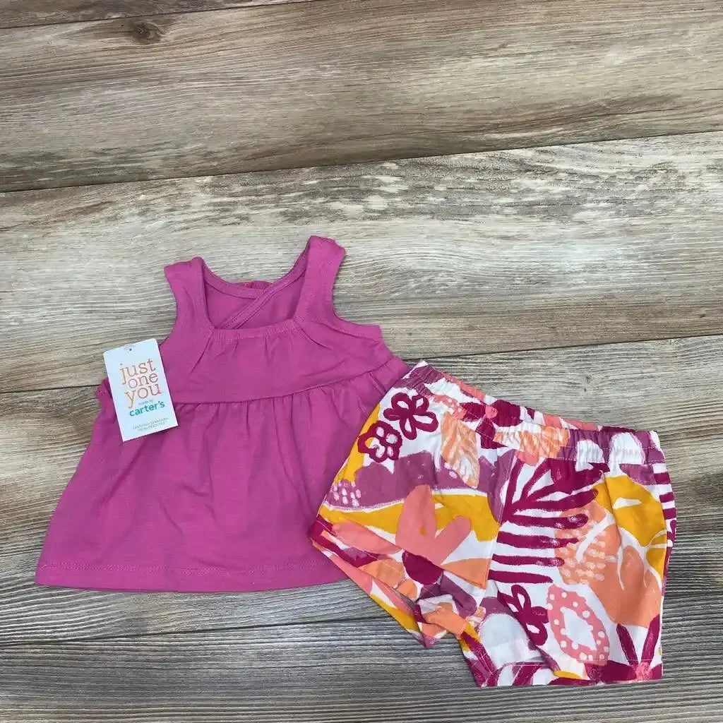 Top view of NEW Just One You 2pc tank top and floral shorts size 3m showcasing magenta tank top and colorful floral shorts on wood