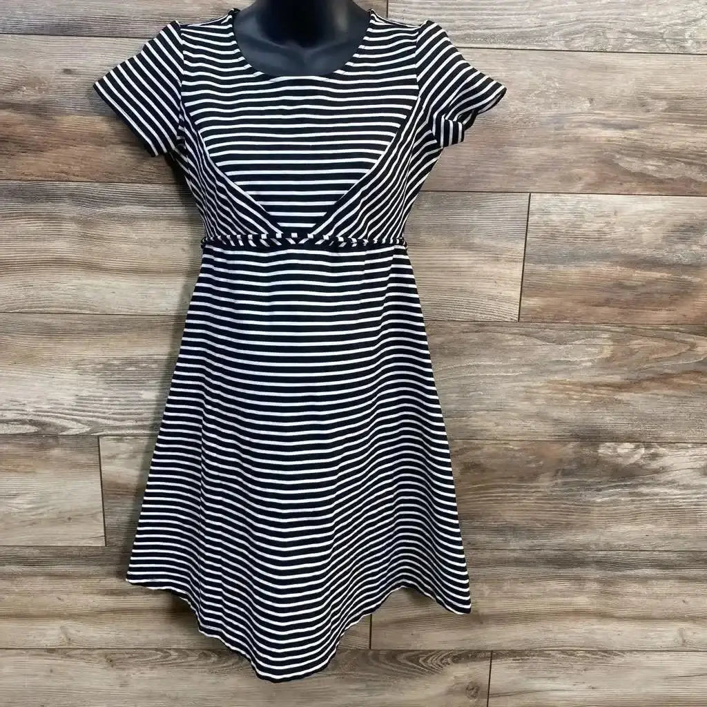 Front view of Jessica Simpson black-and-white striped waist-tie dress with short sleeves and flared skirt on wood background