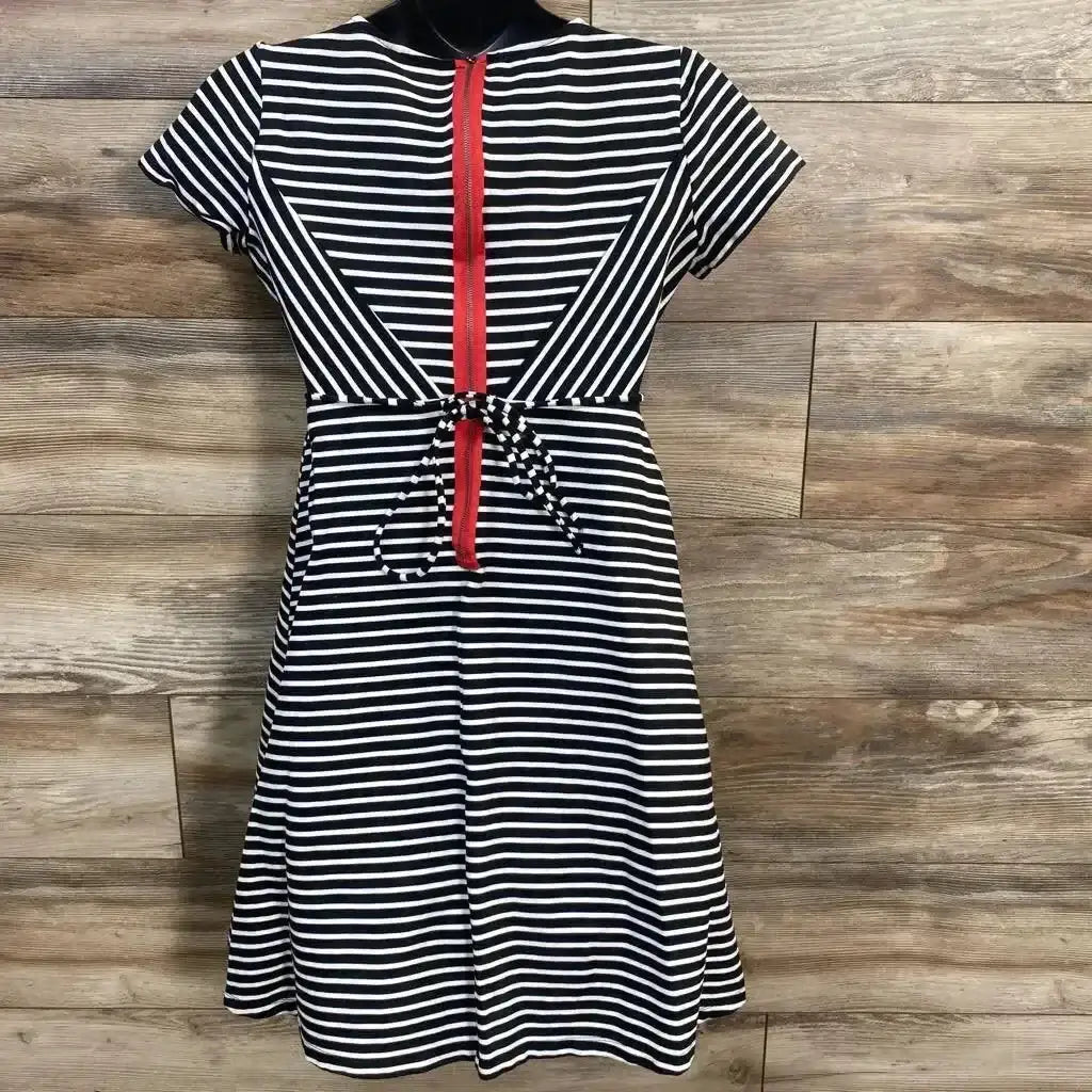 Front view of Jessica Simpson striped black-and-white waist-tie dress with red zipper on mannequin