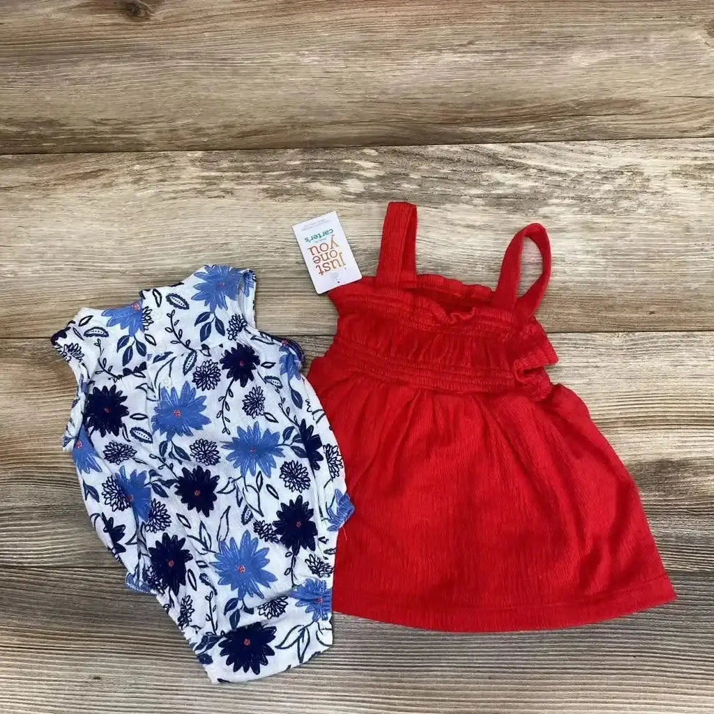Top view of Just One You three-piece floral romper set in size 3 months showcasing floral romper and red dress on wood background