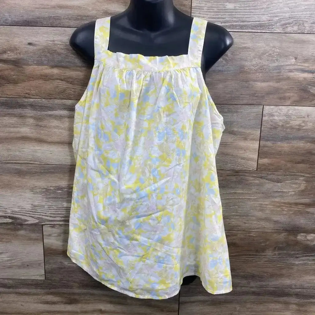 Front view of NEW The Nines by Hatch floral maternity tank top size XXL in yellow blue pastel print on black mannequin and wood plank floor