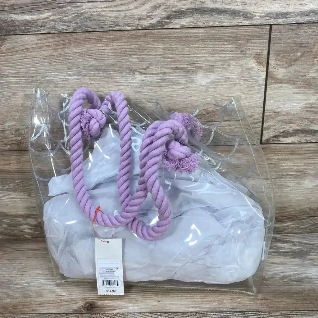 Front view of clear Cat and Jack mermaid purse with lavender twisted rope handles and silver mermaid-scale print on wood plank background