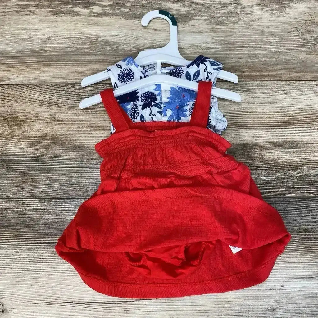 Overhead view of NEW Just One You 3pc Floral Romper Set sz 3m showing red dress, floral romper, and bloomers on hangers