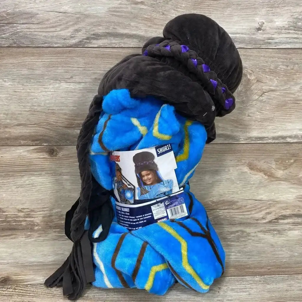 Folded Marvel Black Panther Shuri hooded blanket showcasing a black hood with purple trim and blue patterned fabric on a wood floor