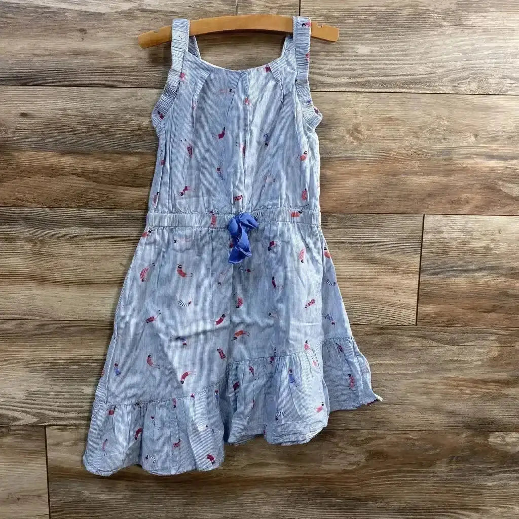 Front view of Catimini blue striped girls dress with ruffle hem, waist tie, and bird print on wooden hanger