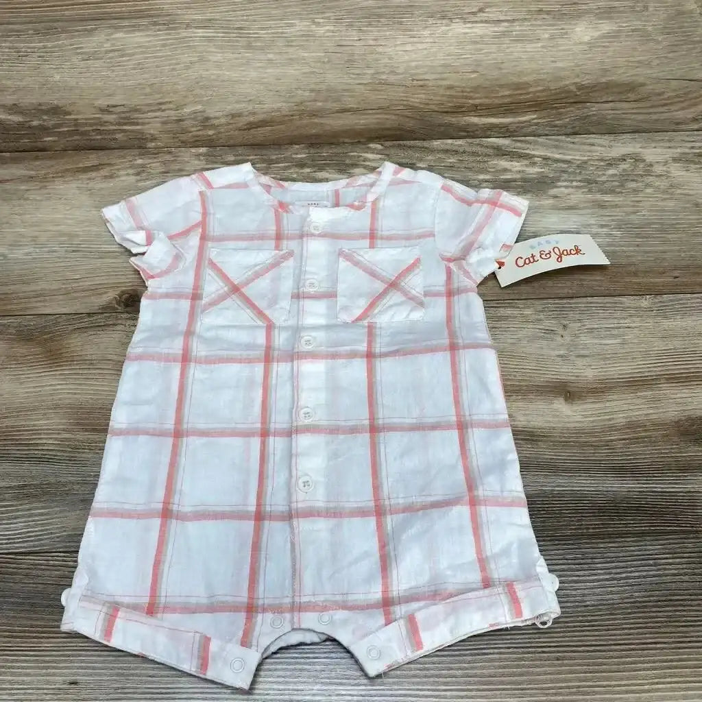 Flat-lay Cat and Jack plaid shortie romper, size 3-6m, front buttons, chest pockets, snap crotch on wood background