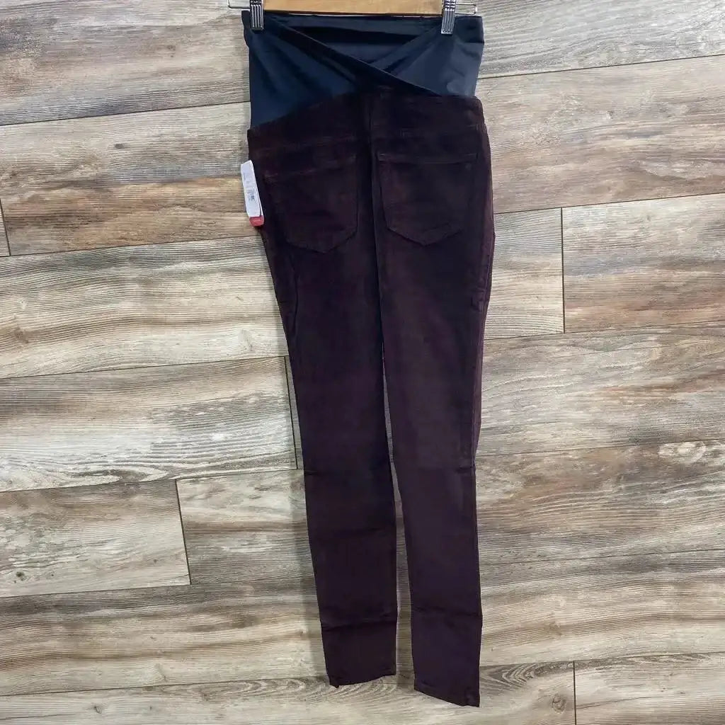 Front view of Isabel maternity crossover-panel skinny jeans in burgundy showing belly panel on white background
