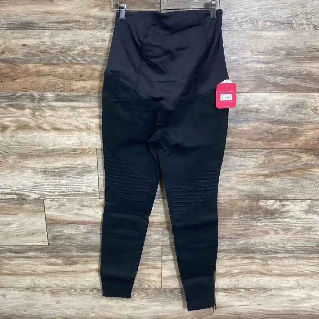 Front view of black Isabel maternity utility jeggings size 0 showing high-rise belly panel, ribbed knee panels and slim fit on wood floor background