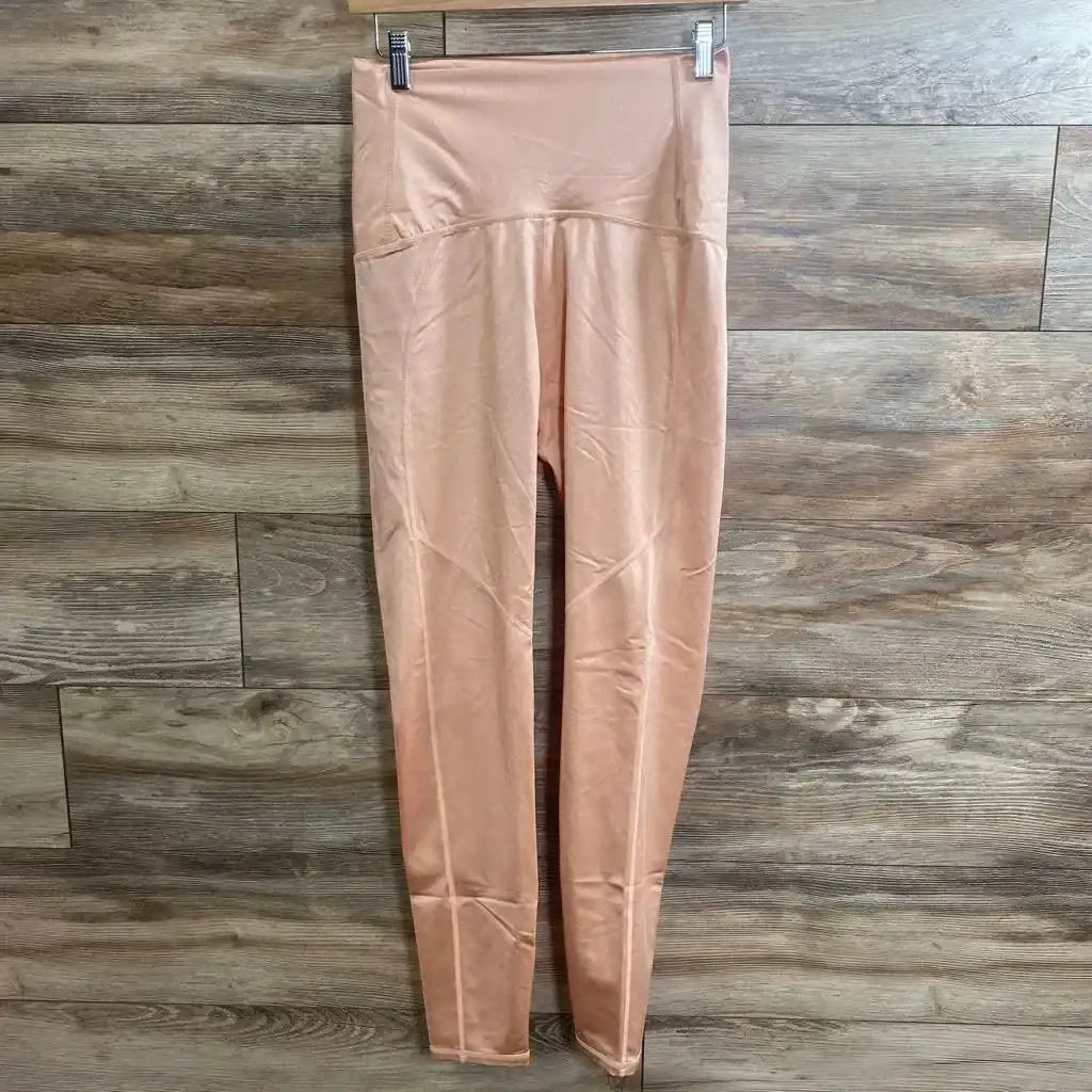 Front view of pink Fabletics high-waisted leggings (medium) showing high-rise waistband and full-length legs on white background