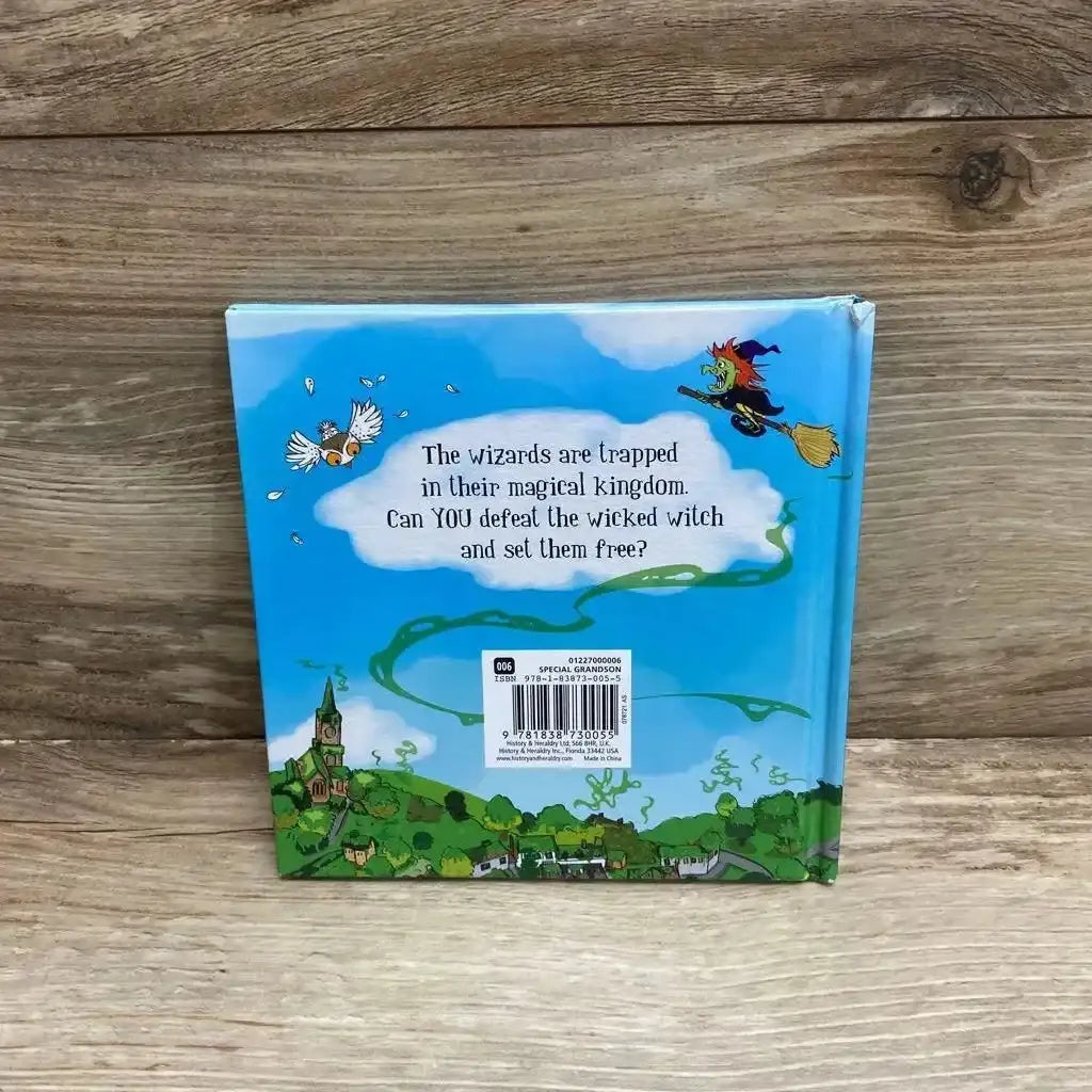 Back cover of My Name Magical Storybooks Special Grandson hardcover with witch and kingdom illustration on wood plank