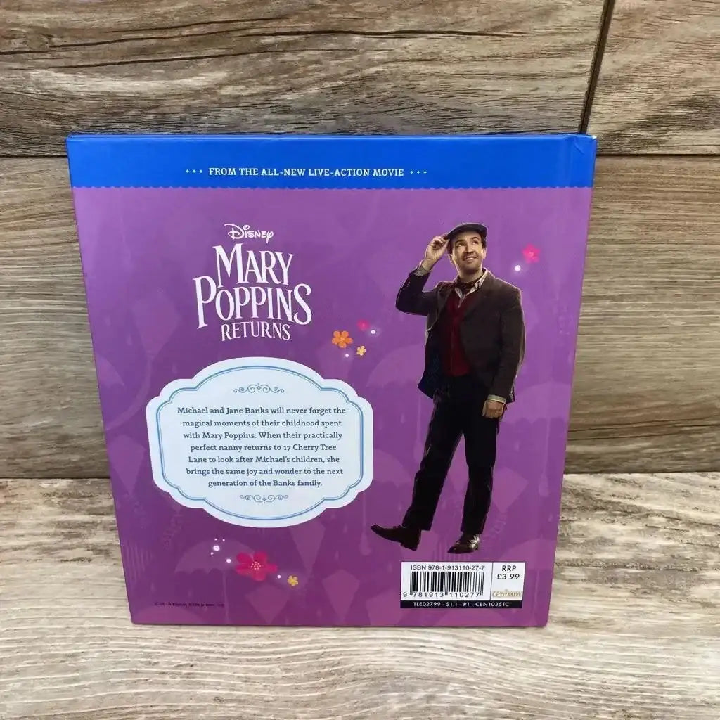 Back of Mary Poppins Returns hardcover showing purple cover with Disney title, character tipping hat, blurb, and barcode