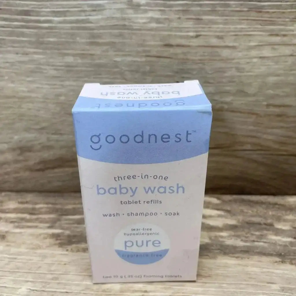 Front view of NEW Goodnest 3-in-1 Wash Shampoo and Soak Tablet Refills showcasing blue and white baby wash box labeled tear-free hypoallergenic on wood plank floor