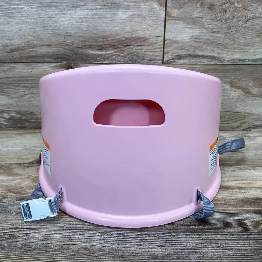 Front view of pink DreamGro Elephant booster seat showcasing backrest with carry handle and gray straps on wood floor