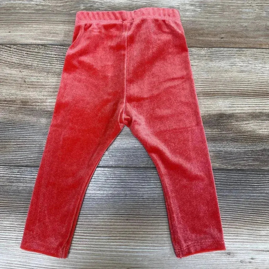 Front view of NEW Okie Dokie Velour Leggings sz 6M showcasing red velour fabric and elastic waistband on a wood-grain background
