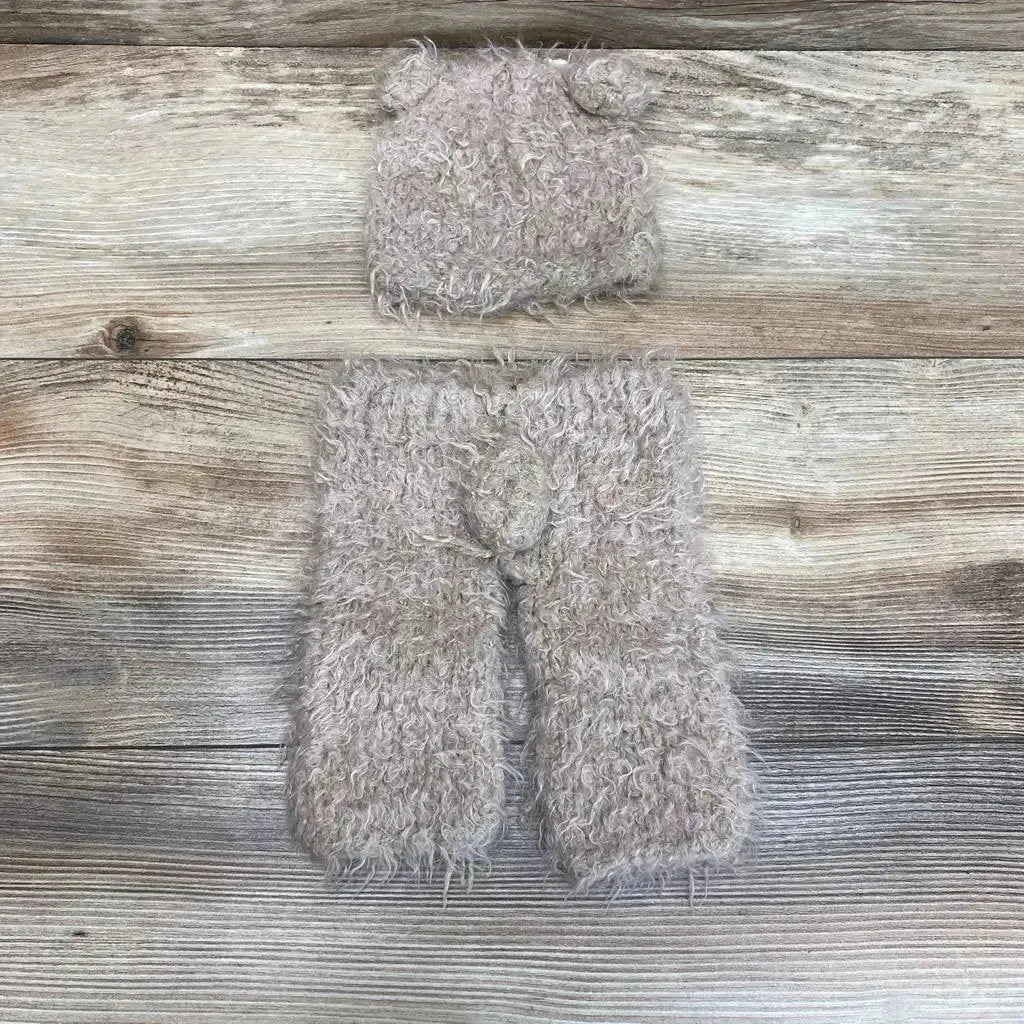 Top view of Bear Hat And Pants Set showcasing fuzzy gray knit hat and pants on a wood-grain background