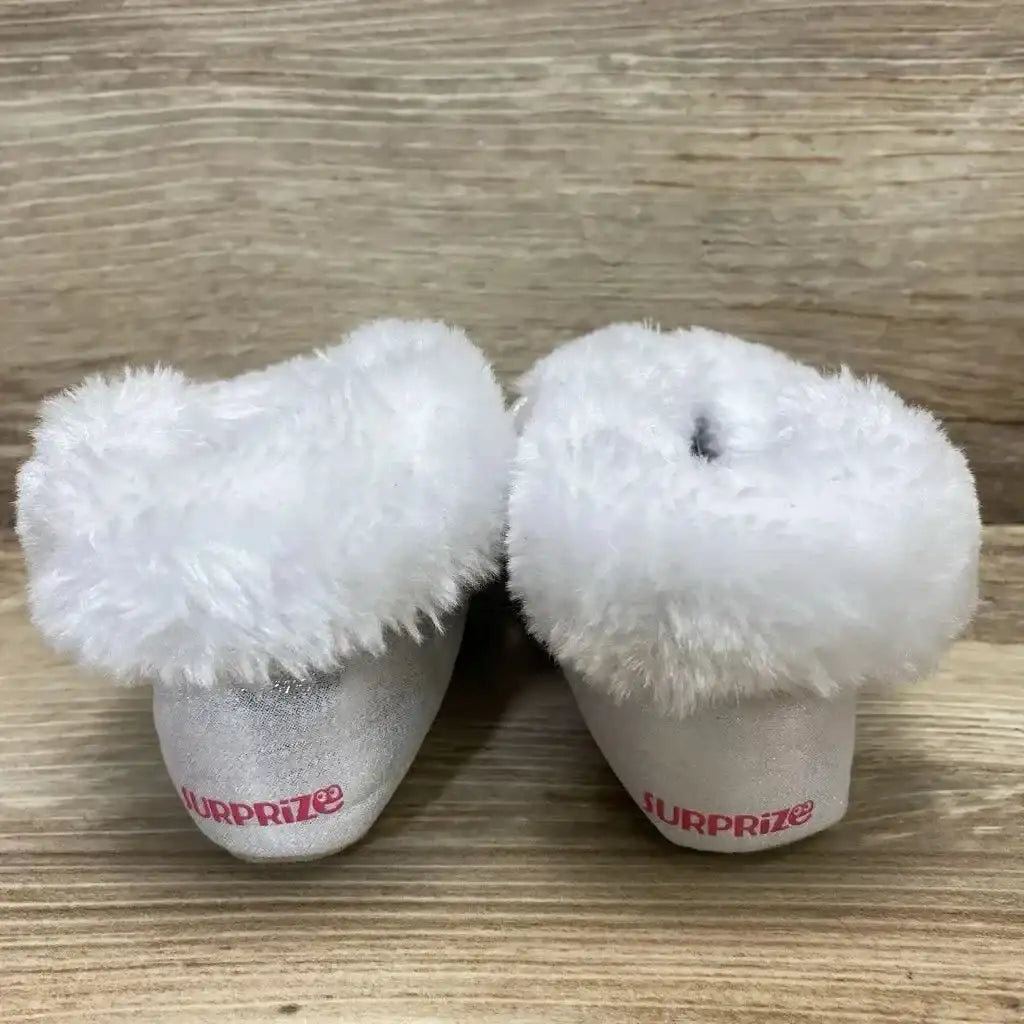 Front three-quarter view of silver toddler ankle booties size 4C showing glitter shimmer upper and side zipper on white background