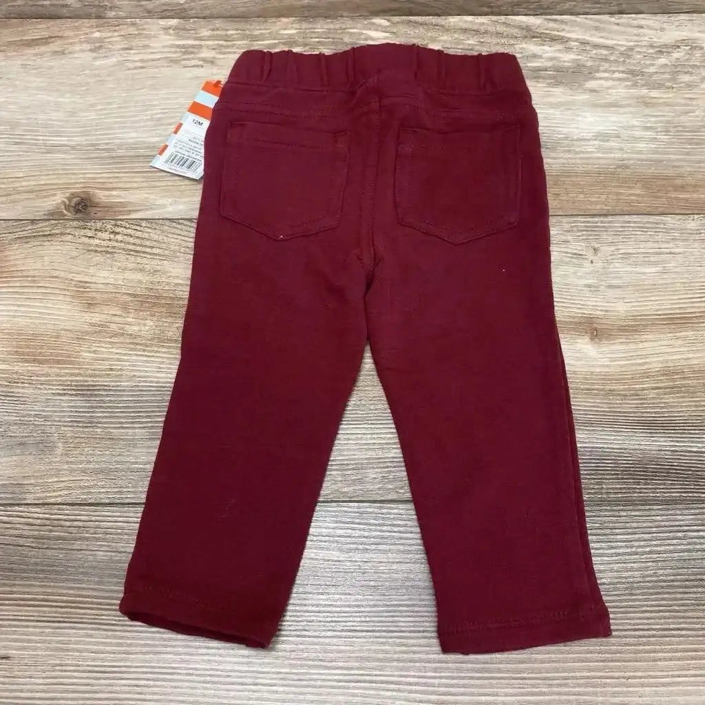 Rear view of NEW Cat & Jack Knit Jegging sz 12m showcasing burgundy color, elastic waistband, and back pockets with wood-look background