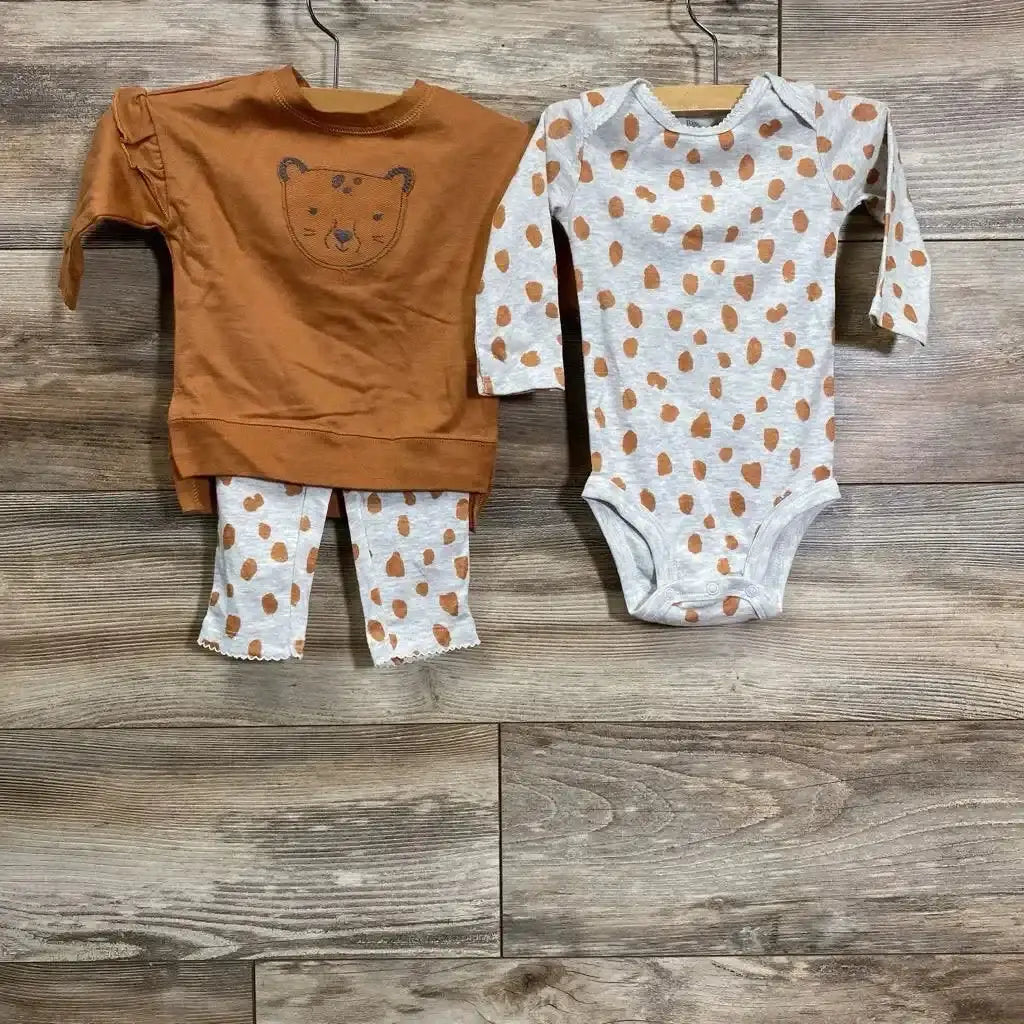 Top view of Just One You 3pc Sweatshirt Set, size 6m, with bear sweatshirt, spotted bodysuit and pants on wood floor