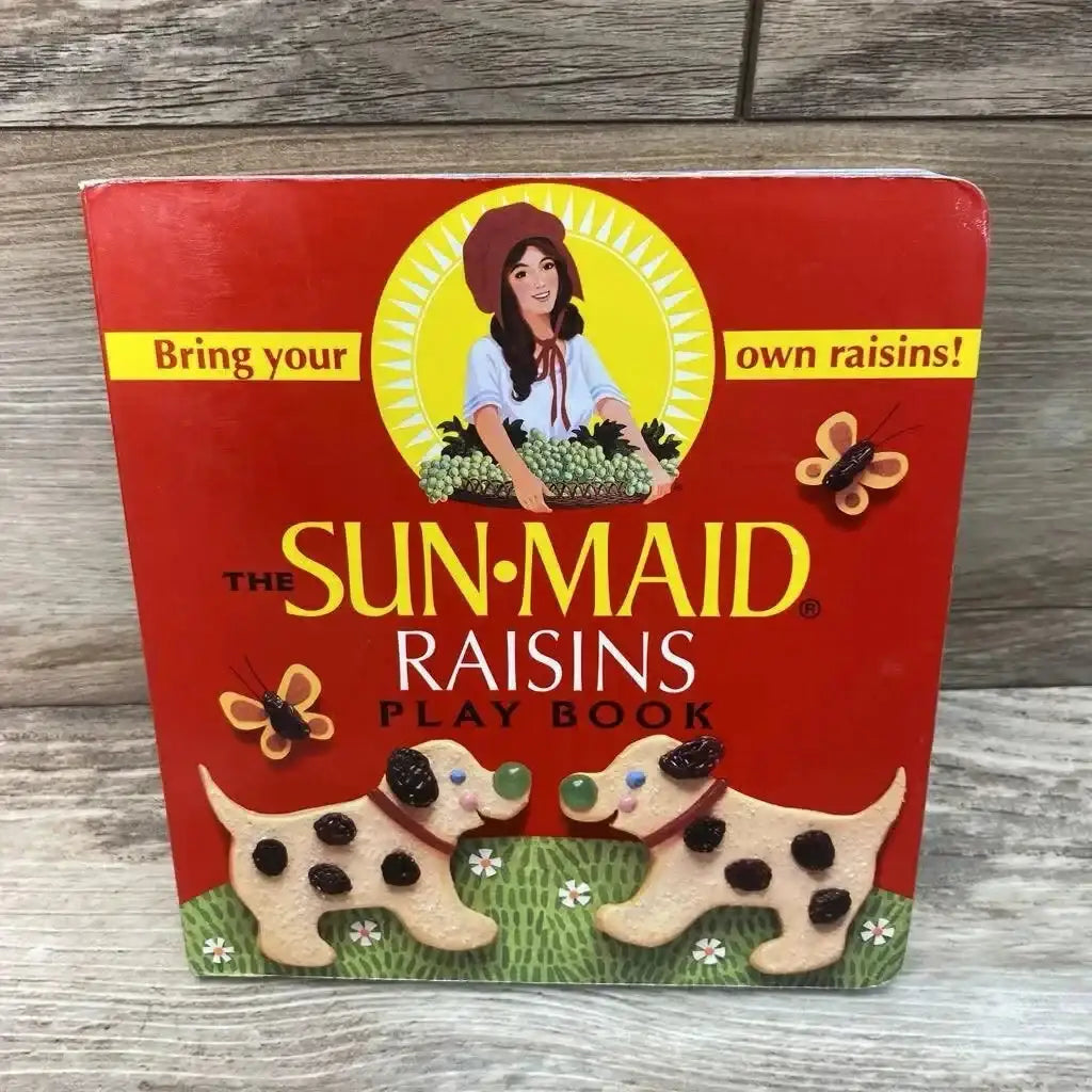 Front cover of Sun-Maid play book with headline Bring your own raisins and two raisin-spotted dogs on red background