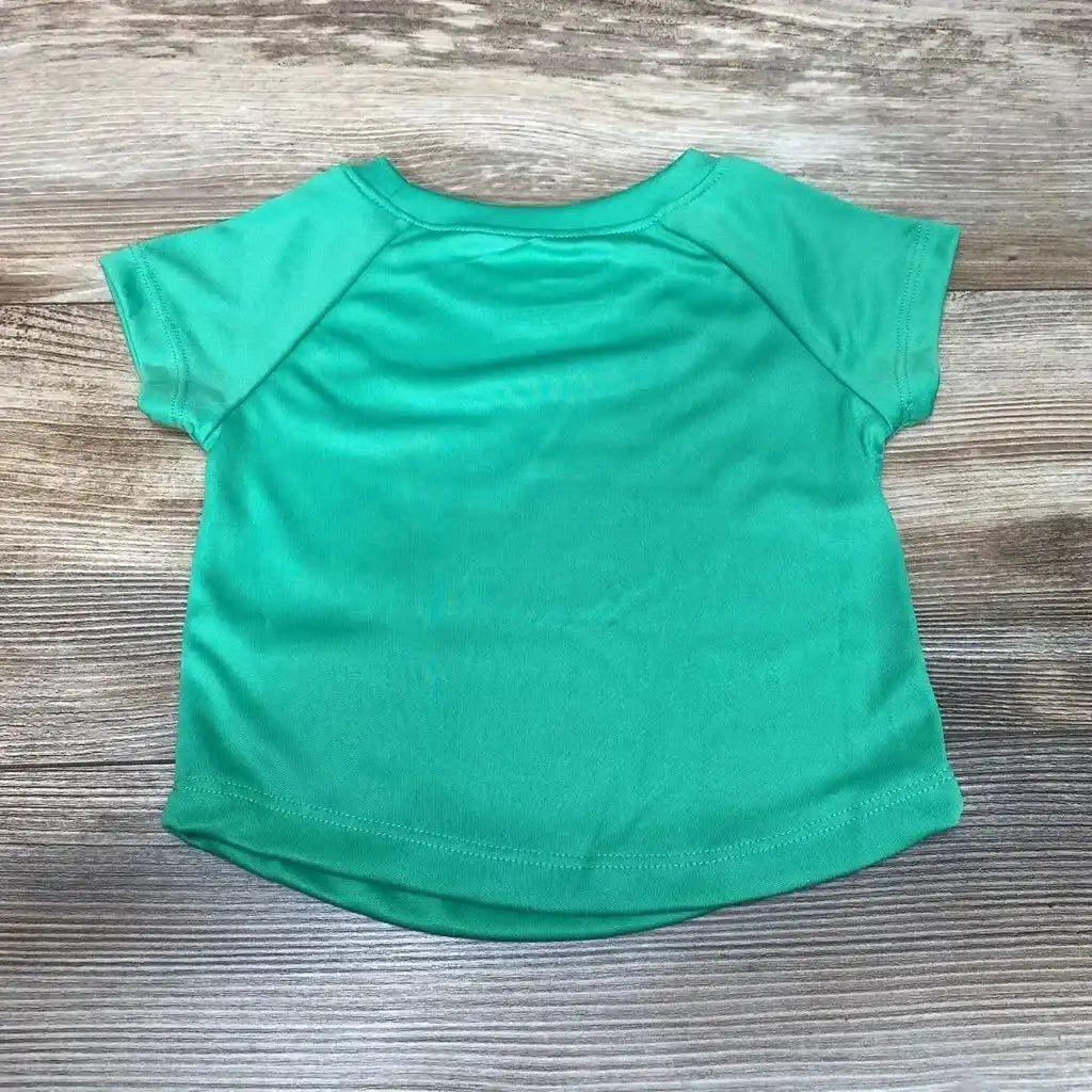Front view of NEW Okie Dokie Scooter Club shirt in size 12m showcasing turquoise short sleeves with a wood-grain background