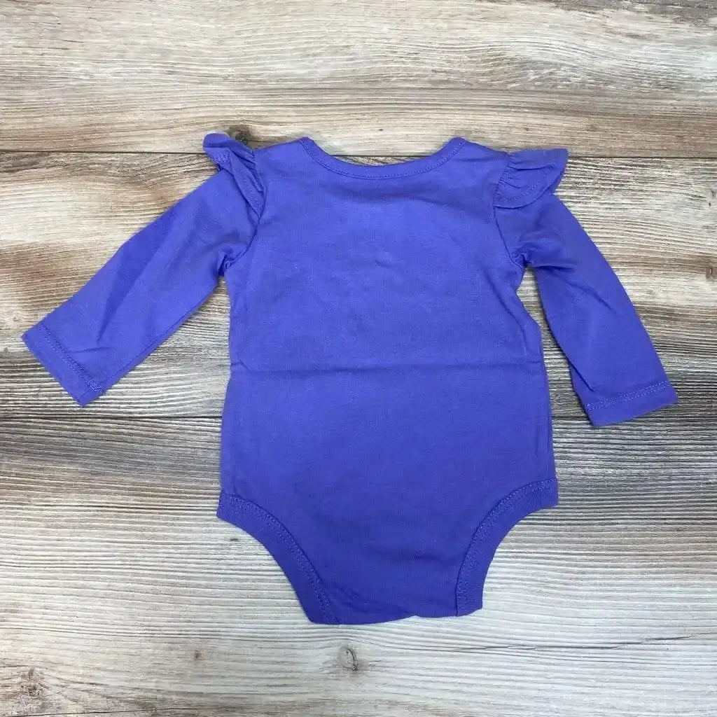 Front view of NEW Okie Dokie Long Sleeve Bodysuit sz 3m showcasing purple fabric and ruffled shoulders on wood grain