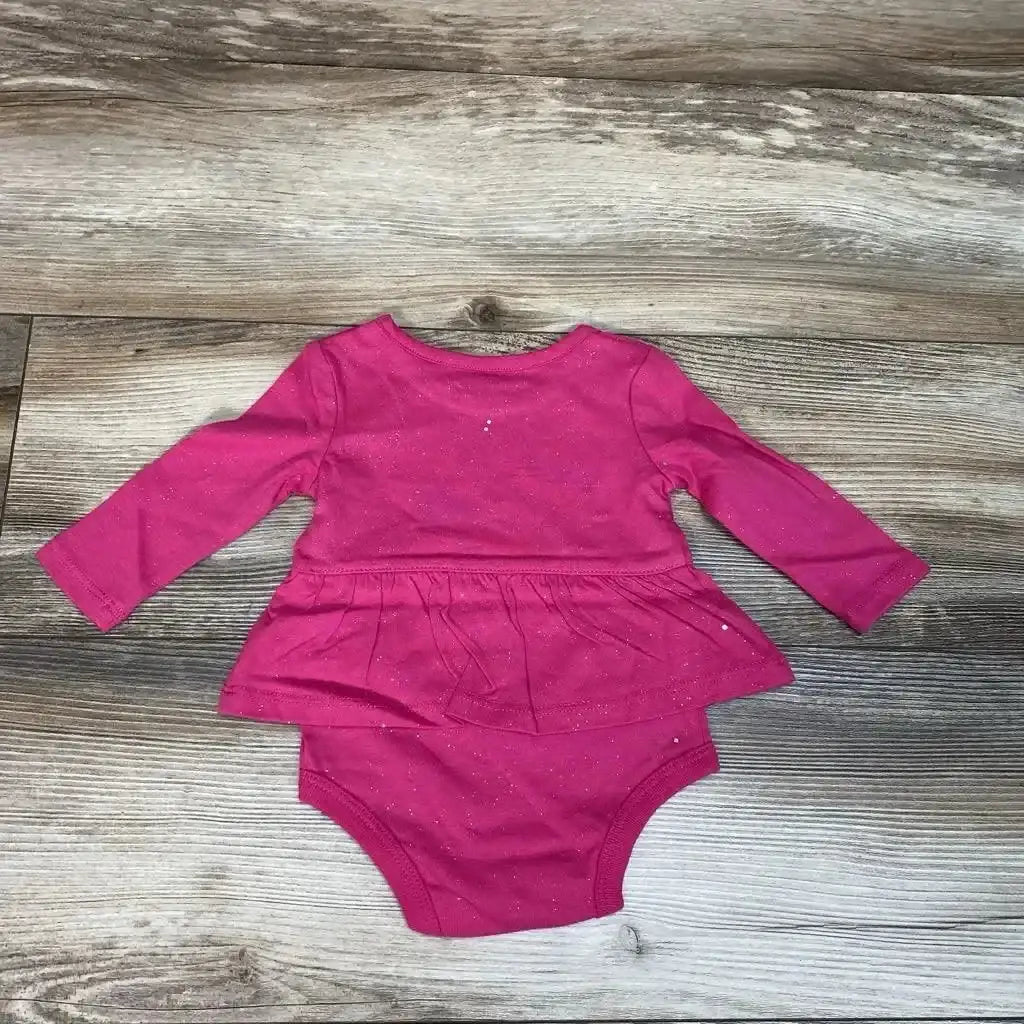 Front view of bright pink NEW Okie Dokie skirted bodysuit, size 3 months, with long sleeves on wood floor