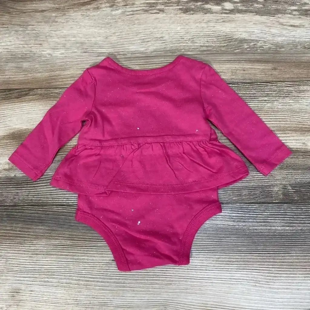 Front view of NEW Okie Dokie skirted bodysuit in size NB, magenta with long sleeves and attached skirt, laid on wood grain