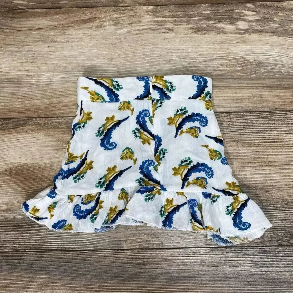 Front view of Bailey’s Blossoms ruffle skirt size 0 to 3M in white rayon with blue paisley print and ruffled hem