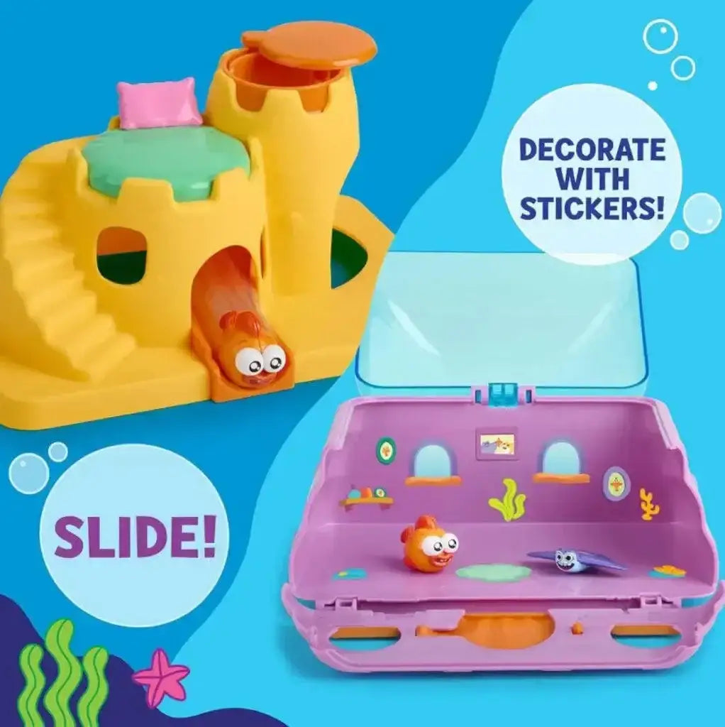 Front view of Baby Shark William's House playset showing yellow slide castle, orange fish toy and open purple carry case with overlay text 'DECORATE WITH STICKERS!' and 'SLIDE!'