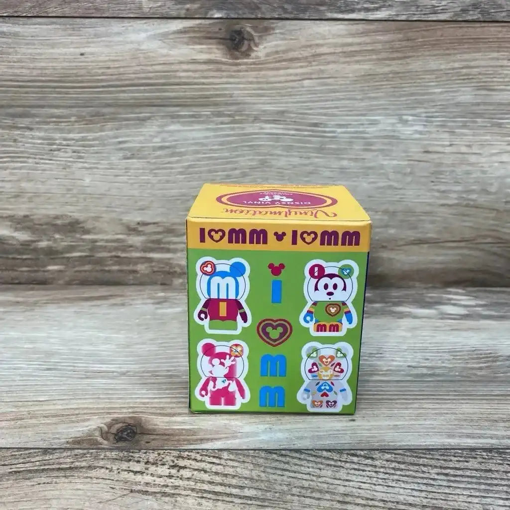 Front view of 3-inch Disney Vinylmation Love Mickey Series figure in pink showcasing heart and Mickey-ear silhouette on white background