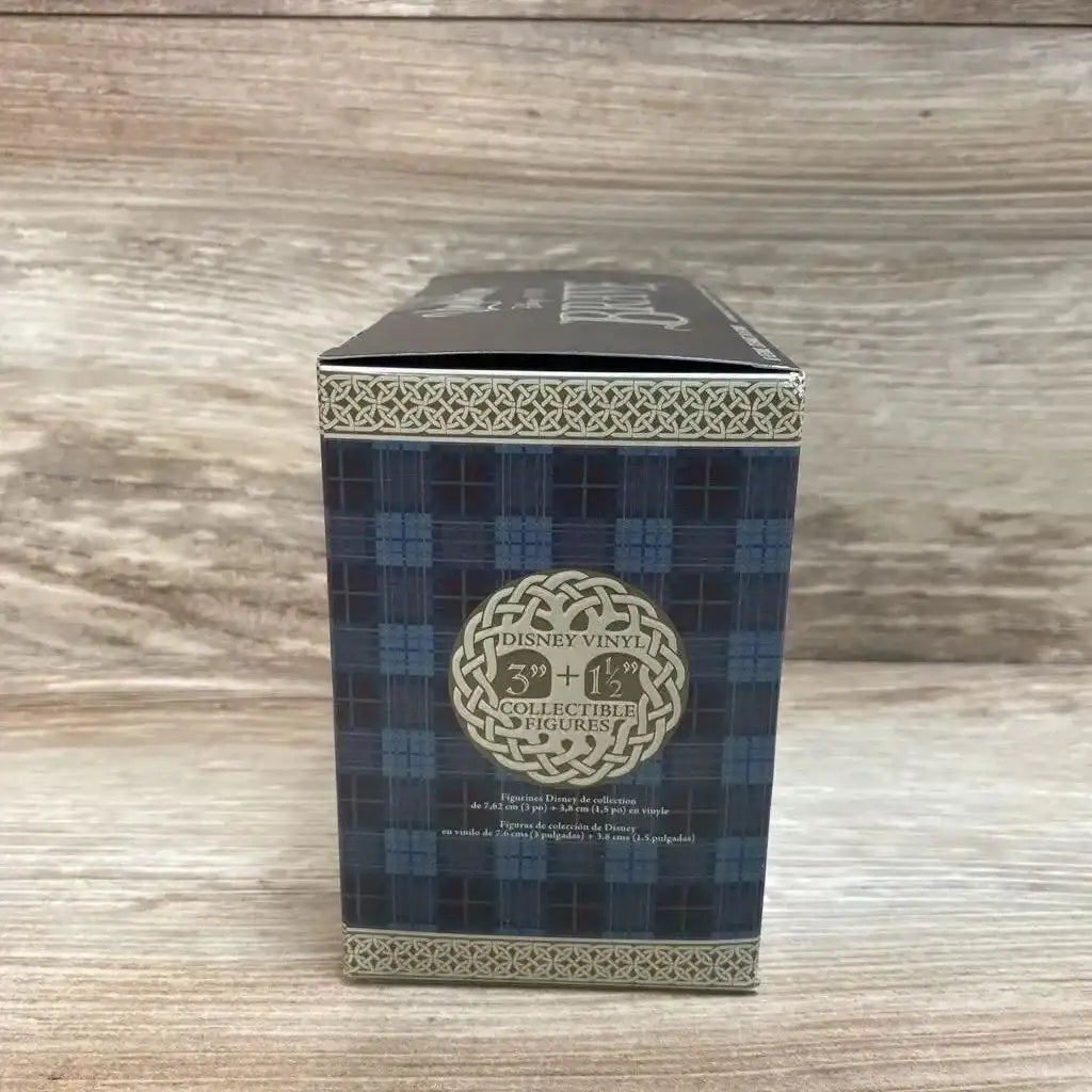 Front view of Disney Vinylmation Brave 4-piece box showing tartan pattern and label listing 3 in and 1.5 in figures