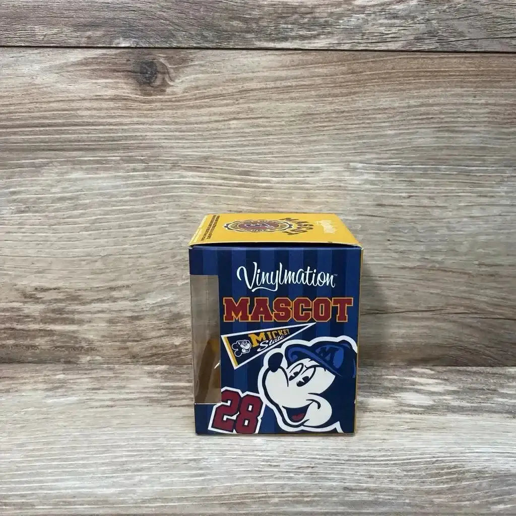 Front view of boxed 3-inch Vinylmation Mascot Series Goofy with clear display window and mascot graphics on a light wood background