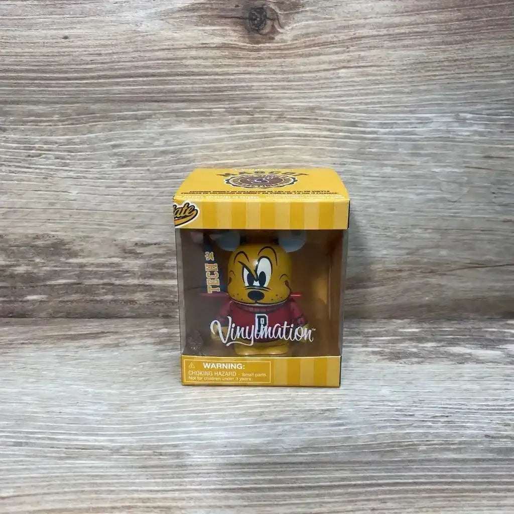 Front view of NWT Disney Vinylmation Mascot Series Pluto figure in yellow striped window box on wood plank floor