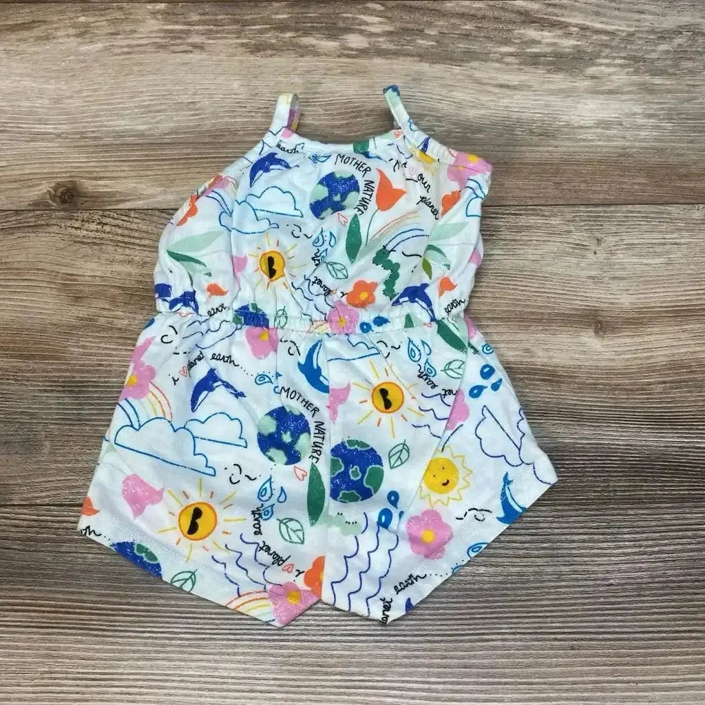 Flat lay of Old Navy baby romper 0-3M showing colorful Mother Nature print and elastic waist on wood background