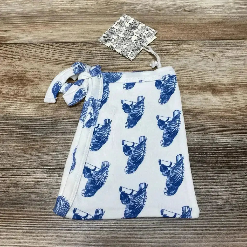 Front view of Kate Quinn baby elf hat showing blue parrot applique, pointy top, and folded cuff on white background, 6 to 12 months