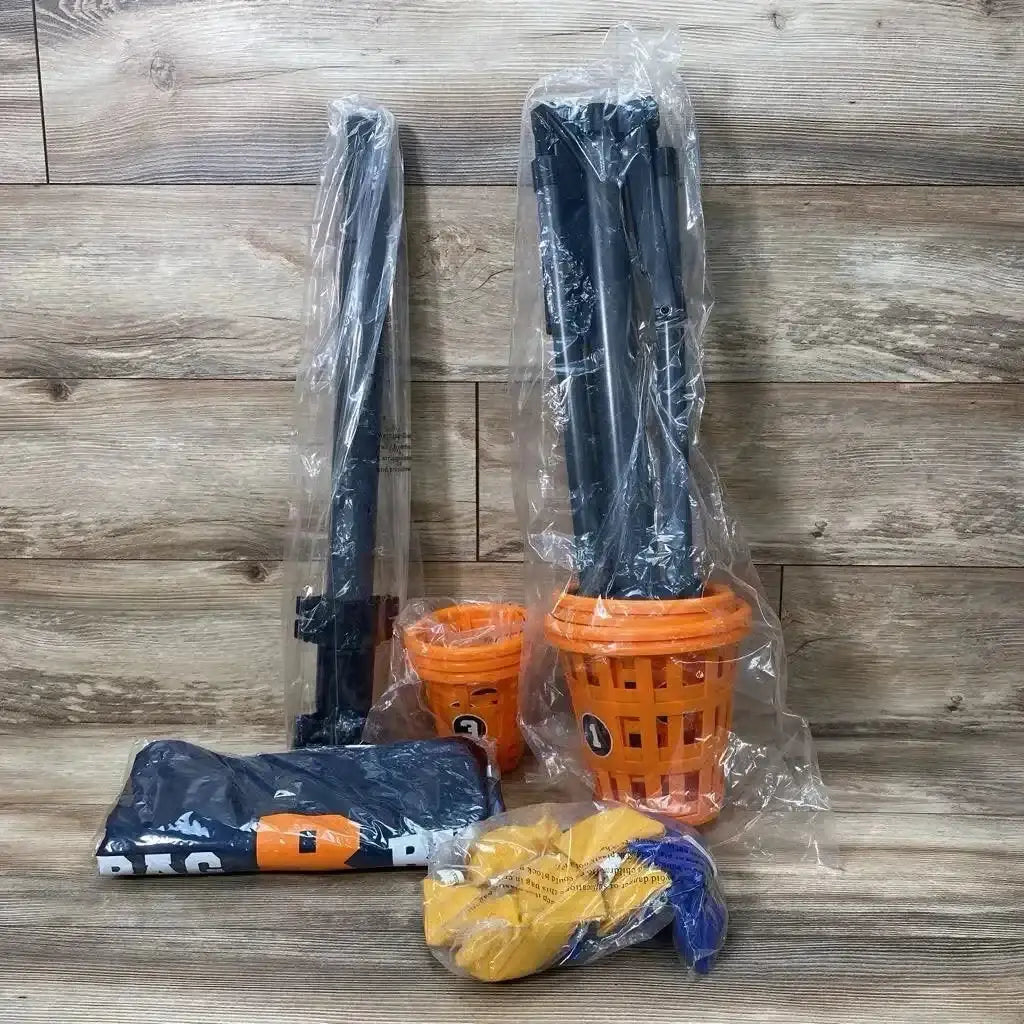 Front view of B3 Bean Bag Bucketz set with two orange buckets, black poles, and yellow and blue bean bags on wood background