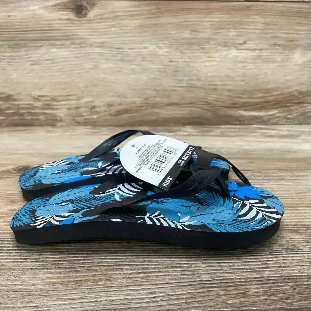 Side view of blue Juncture toddler sandal size 13c with Velcro straps and textured rubber sole on white background