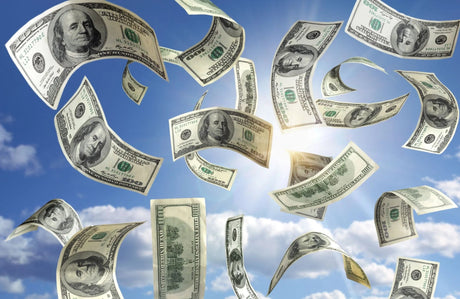 Hundred-dollar bills floating across a sunny blue sky, symbolizing money slipping away