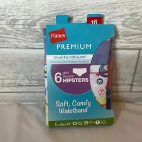Front view of Hanes girls ComfortBlend 6-pack hipsters size 16 showing Premium label and Soft Comfy Waistband on wood
