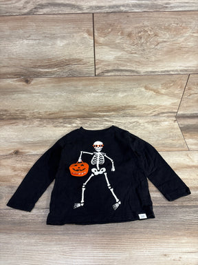 Black kids Halloween long sleeve shirt with skeleton holding pumpkin, perfect for spooky season fun