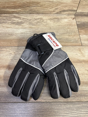 Pair of black and gray insulated children's winter gloves with adjustable strap on wooden floor